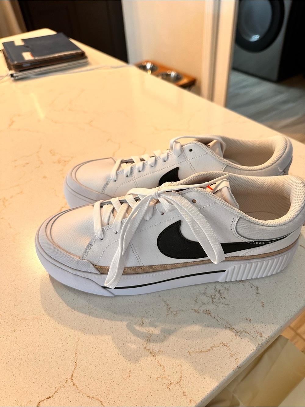 Nike Women’s White Sneakers with Black Swoosh and Tan Accent
